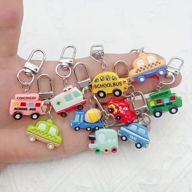 Luggage - 10 buah gantungan kunci mobil kartun